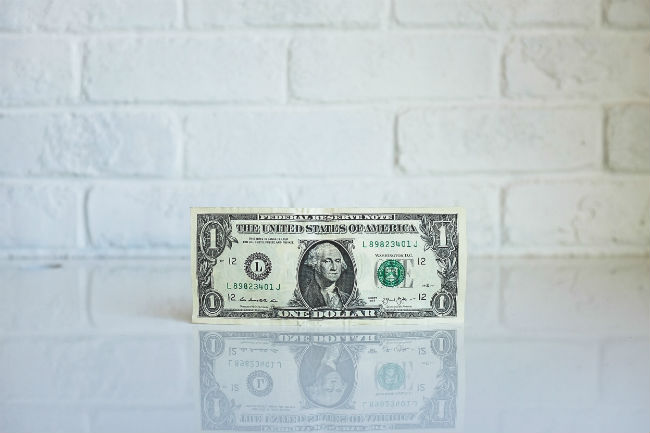 dollar on the table with white background