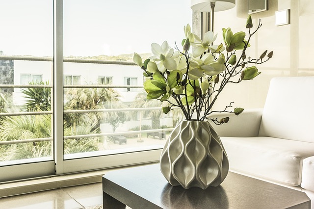 aliding windows with white table and indoorplant